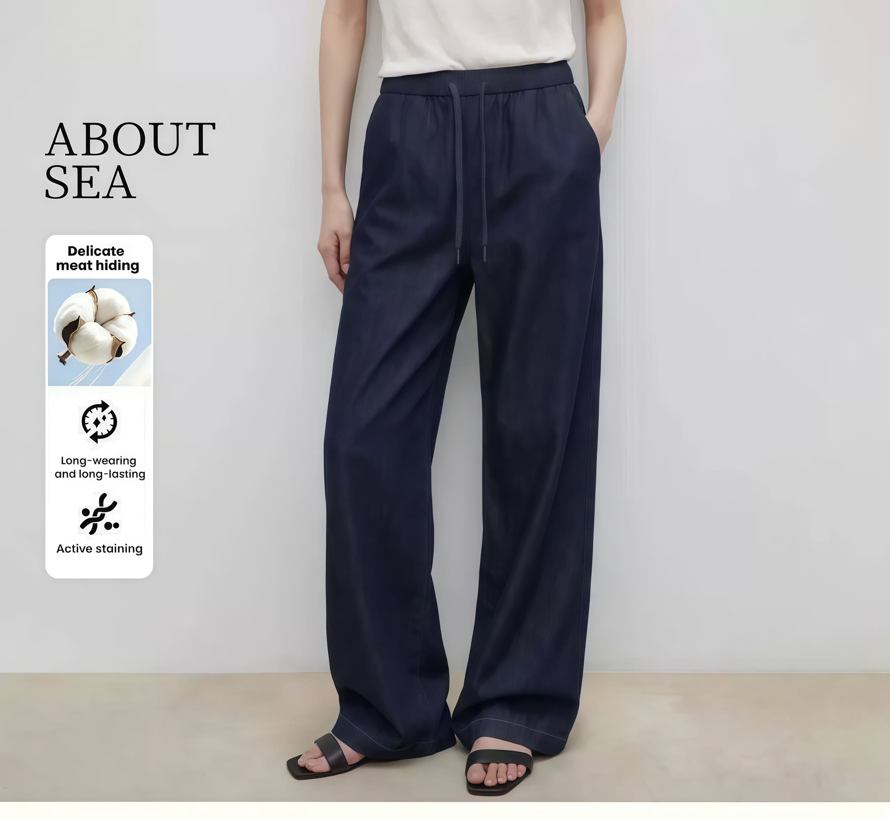 Navy wide-leg trousers shown with silhouette and finish details