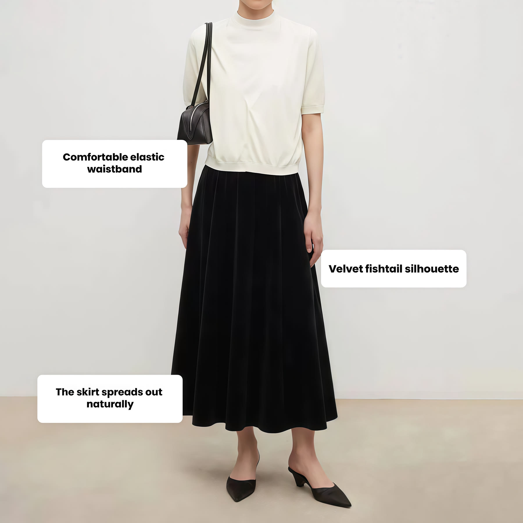 White sleeveless top coordinated with a long black skirt